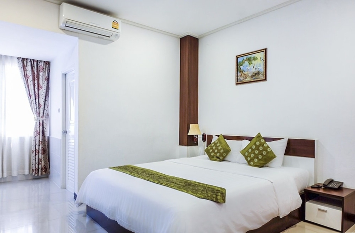 Imagen de la habitación del Hotel Chokdee Place. Foto 7