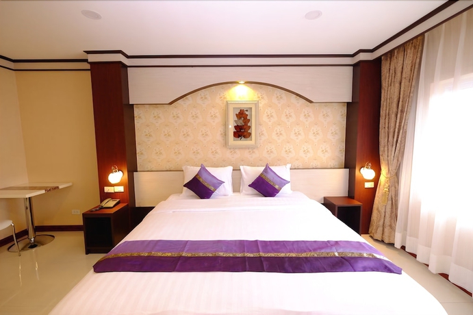 Imagen de la habitación del Hotel Chokdee Place. Foto 15