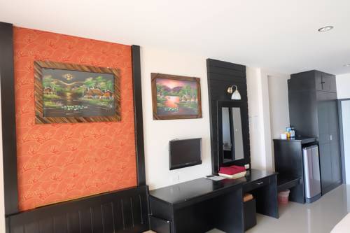 Imagen de la habitación del Hotel Chokdee Resort. Foto 9