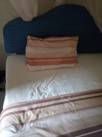 Imagen de la habitación del Hotel Choma Tamu. Foto 8