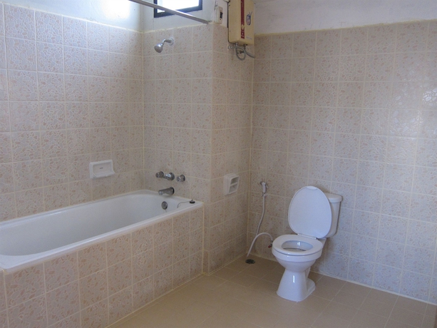 Imagen de la habitación del Hotel Chomdoi House. Foto 14