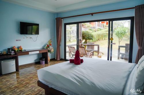 Imagen de la habitación del Hotel Chomview Lanta Water Park Resort. Foto 17