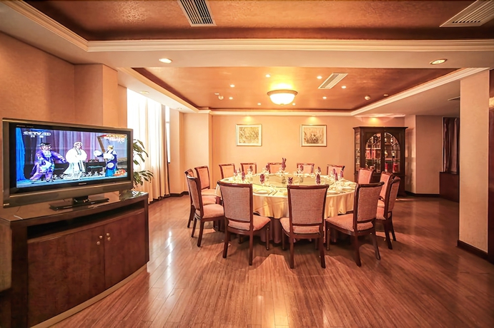 Imagen del bar/restaurante del Hotel Chongqing Carlton. Foto 7