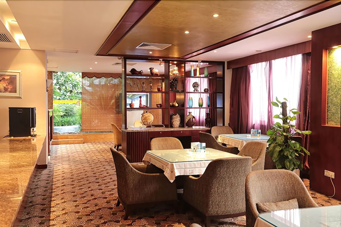 Imagen del bar/restaurante del Hotel Chongqing Carlton. Foto 8