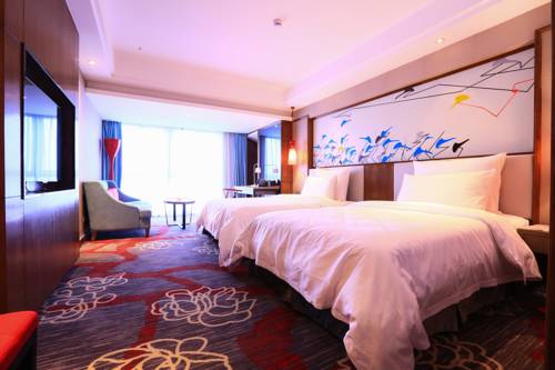 Imagen de la habitación del Hotel Chongqing Dongmo. Foto 2