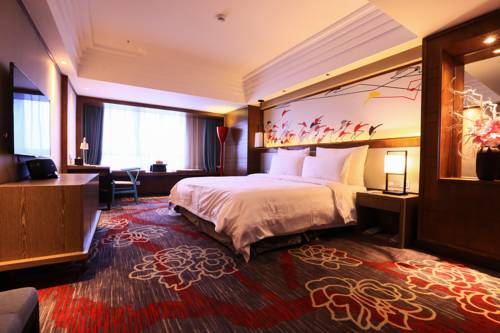 Imagen de la habitación del Hotel Chongqing Dongmo. Foto 5