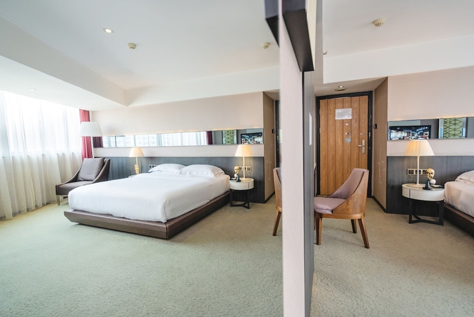 Imagen de la habitación del Hotel Chongqing KaoYu. Foto 2