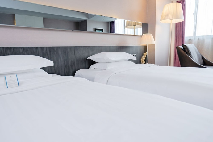 Imagen de la habitación del Hotel Chongqing KaoYu. Foto 7