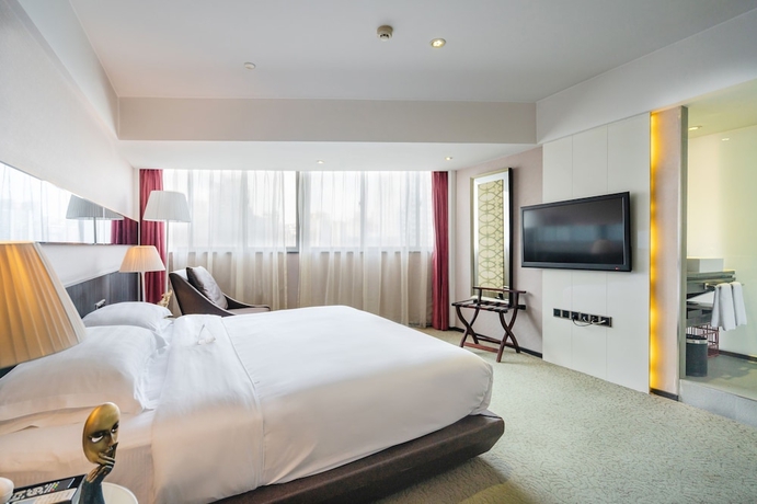 Imagen de la habitación del Hotel Chongqing KaoYu. Foto 10