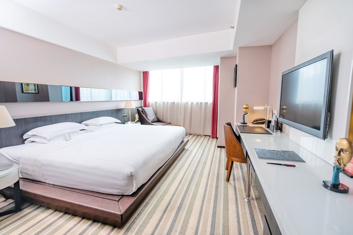 Imagen de la habitación del Hotel Chongqing KaoYu. Foto 11