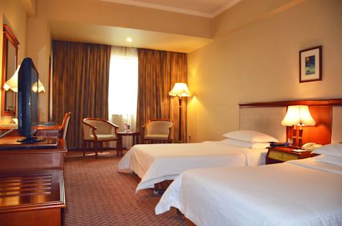 Imagen de la habitación del Hotel Chongqing Liyuan. Foto 2