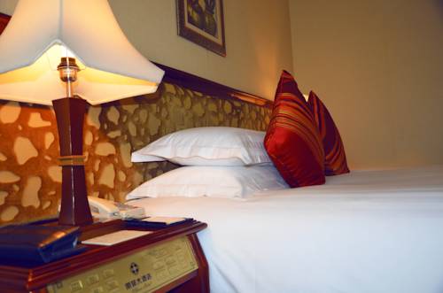 Imagen de la habitación del Hotel Chongqing Liyuan. Foto 4