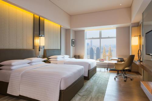 Imagen de la habitación del Hotel Chongqing Marriott Hotel. Foto 4