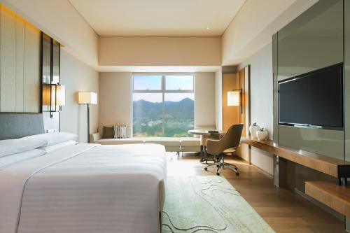 Imagen de la habitación del Hotel Chongqing Marriott Hotel. Foto 6