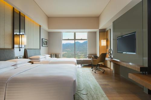 Imagen de la habitación del Hotel Chongqing Marriott Hotel. Foto 7