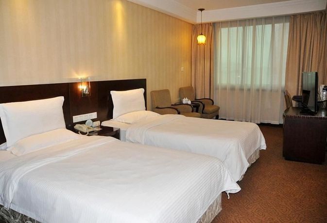 Imagen de la habitación del Hotel Chongqing South Garden. Foto 12