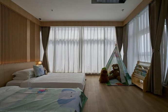 Imagen de la habitación del Hotel Chongqing Xanadu Moon. Foto 3