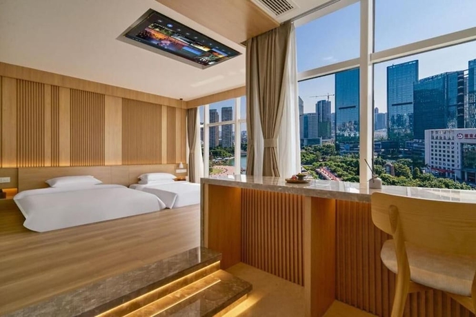 Imagen de la habitación del Hotel Chongqing Xanadu Moon. Foto 4