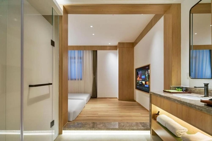 Imagen de la habitación del Hotel Chongqing Xanadu Moon. Foto 6