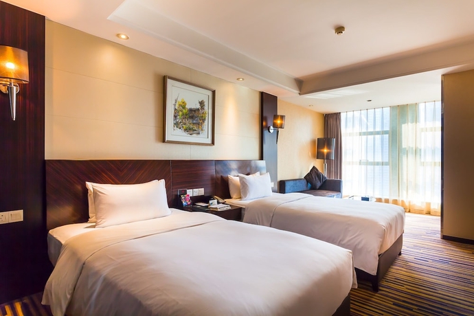 Imagen de la habitación del Hotel Chongqing YiMei. Foto 13