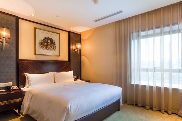 Imagen de la habitación del Hotel Chongqing YiMei. Foto 14