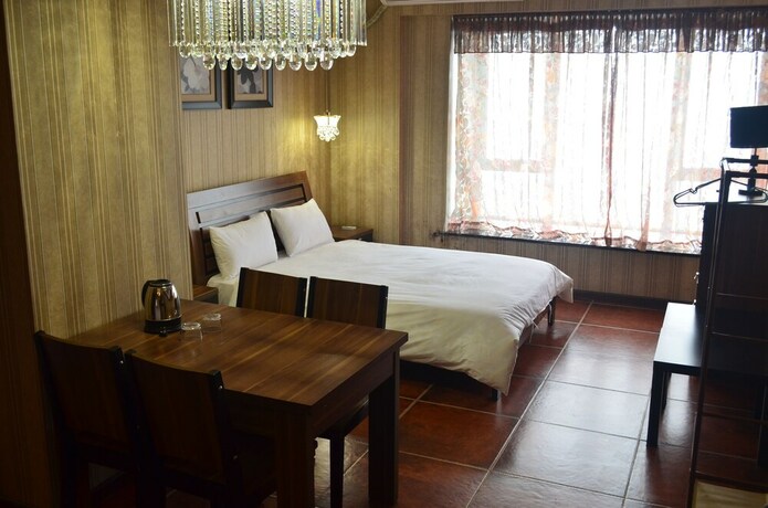 Imagen de la habitación del Hotel Chongqing Yunfei Resort. Foto 3