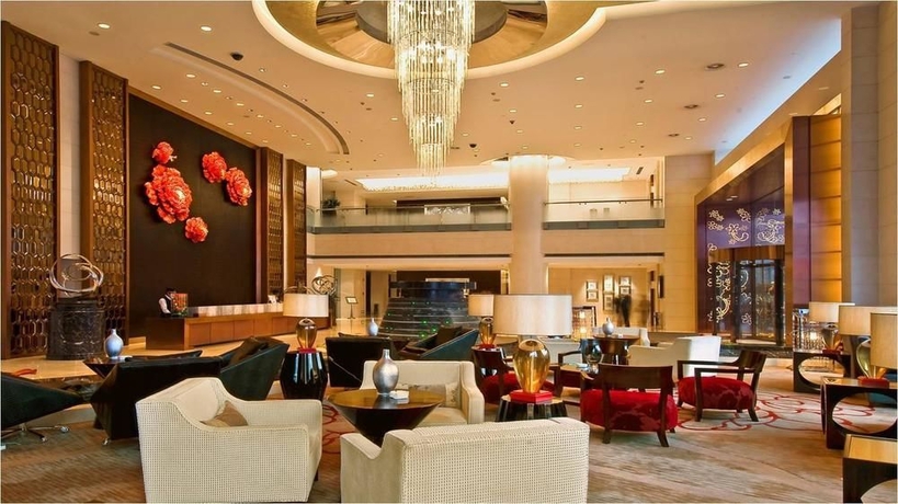 Imagen de los interiores del Hotel Chongquing Jinjiang Oriental. Foto 5