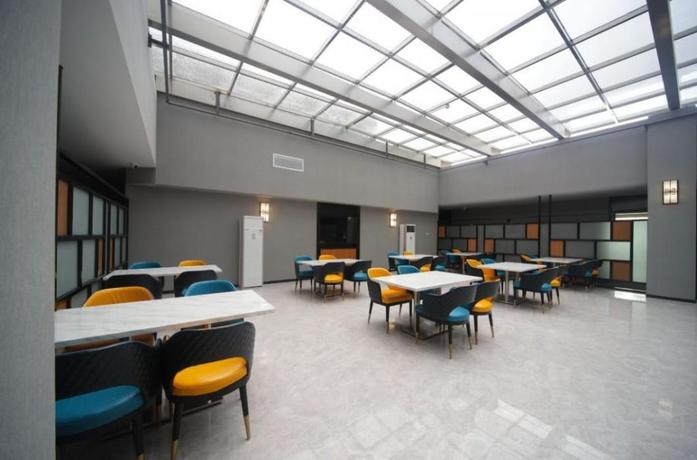 Imagen general del Hotel Chonpines Hotela Guangzhou Rongchuang Wenlvcheng. Foto 2