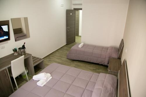 Imagen de la habitación del Hotel Chrismare. Foto 10