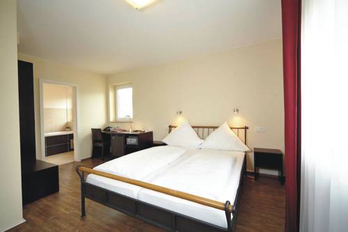 Imagen de la habitación del Hotel Christiana's Wein and Art. Foto 9