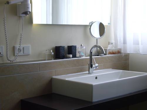 Imagen de la habitación del Hotel Christiana's Wein and Art. Foto 16