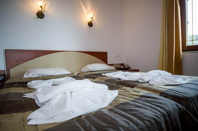 Imagen de la habitación del Hotel Christina\'s Garden. Foto 11