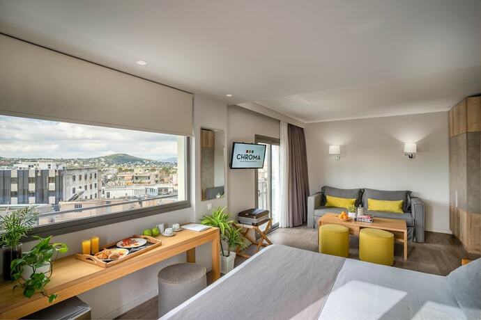 Imagen de la habitación del Hotel Chroma Fashion Rooms and Apartments. Foto 11