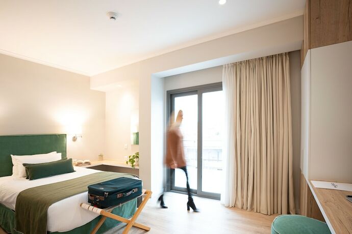 Imagen de la habitación del Hotel Chroma Fashion Rooms and Apartments. Foto 15