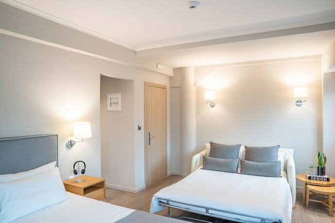 Imagen de la habitación del Hotel Chroma Fashion Rooms and Apartments. Foto 16