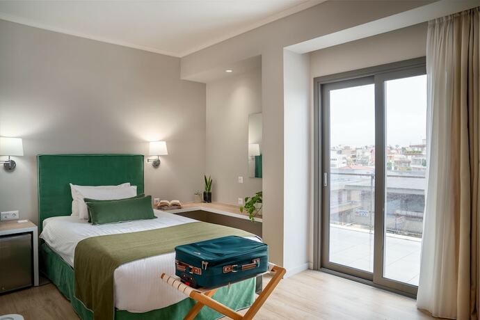 Imagen de la habitación del Hotel Chroma Fashion Rooms and Apartments. Foto 18