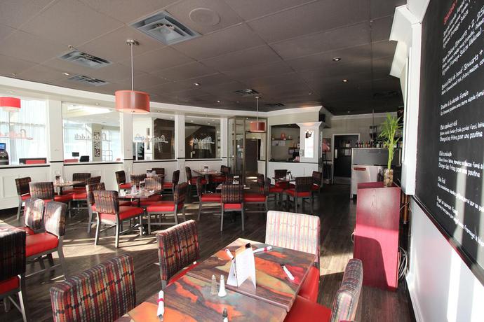 Imagen del bar/restaurante del Hotel Chrome Montreal Centre Ville. Foto 3