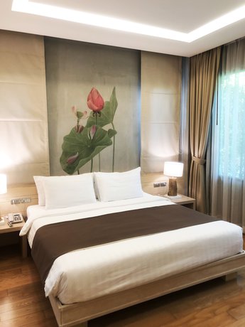 Imagen de la habitación del Hotel Chu, Chiang Mai. Foto 12