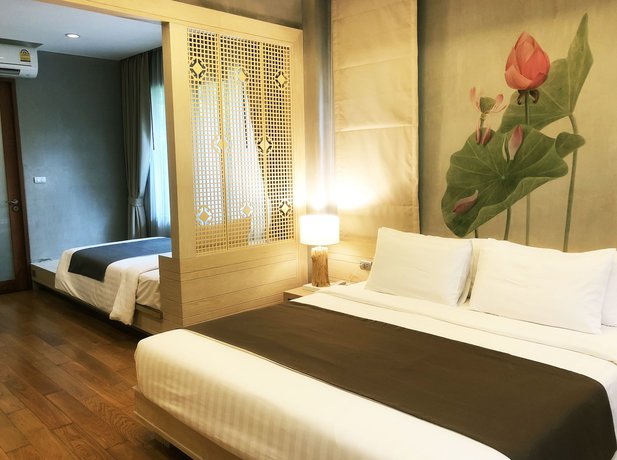Imagen de la habitación del Hotel Chu, Chiang Mai. Foto 13