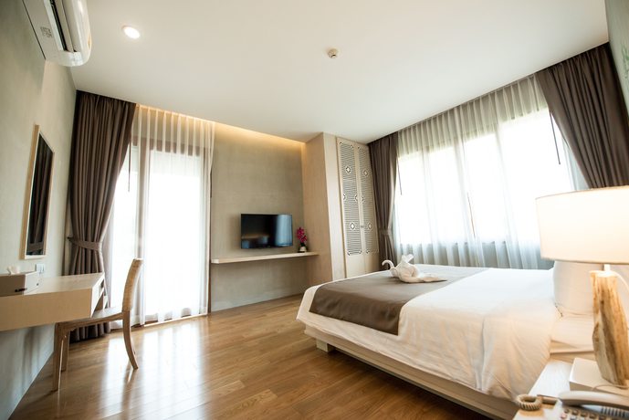 Imagen de la habitación del Hotel Chu, Chiang Mai. Foto 16
