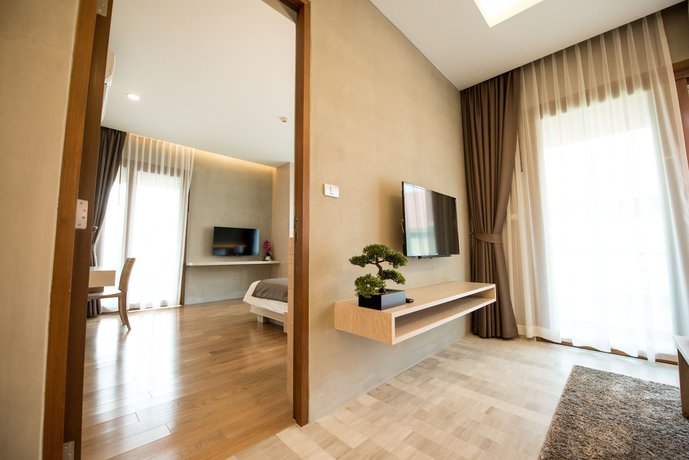 Imagen de la habitación del Hotel Chu, Chiang Mai. Foto 17