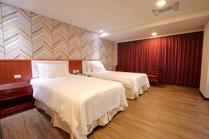 Imagen de la habitación del Hotel Chuanfu. Foto 6