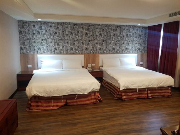 Imagen de la habitación del Hotel Chuanfu. Foto 13