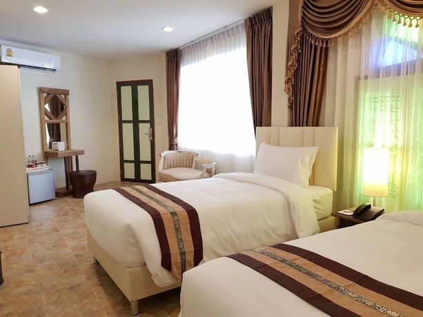 Imagen de la habitación del Hotel Chuchai Buri Sri Amphawa. Foto 4