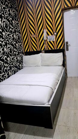 Imagen de la habitación del Hotel Chukzie Suites And Apartments. Foto 12