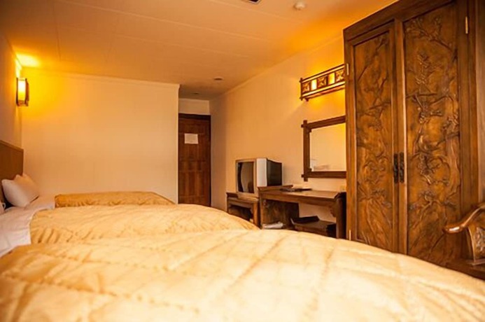 Imagen de la habitación del Hotel Chun Jing Hillview Villa. Foto 3
