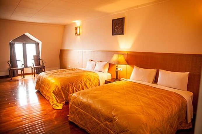 Imagen de la habitación del Hotel Chun Jing Hillview Villa. Foto 12