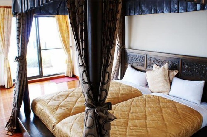 Imagen de la habitación del Hotel Chun Jing Hillview Villa. Foto 15