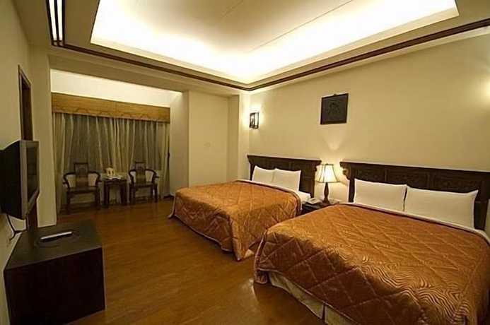 Imagen de la habitación del Hotel Chun Jing Hillview Villa. Foto 17