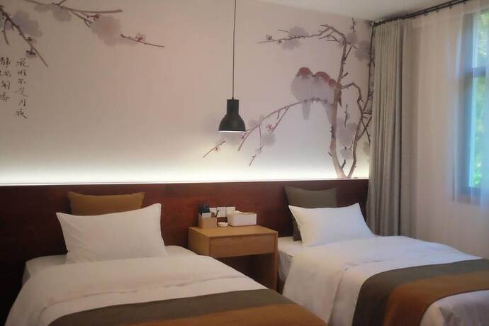 Imagen de la habitación del Hotel Chunan Qishe Botique Guest House. Foto 2